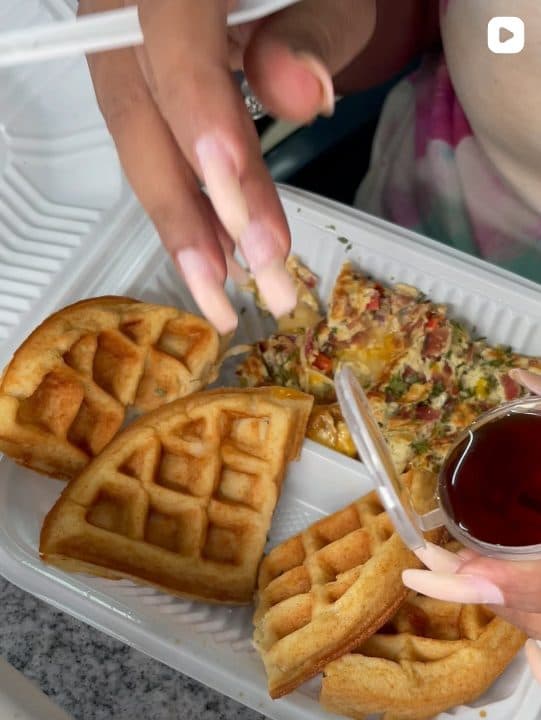 Waffles with omelette and syrup